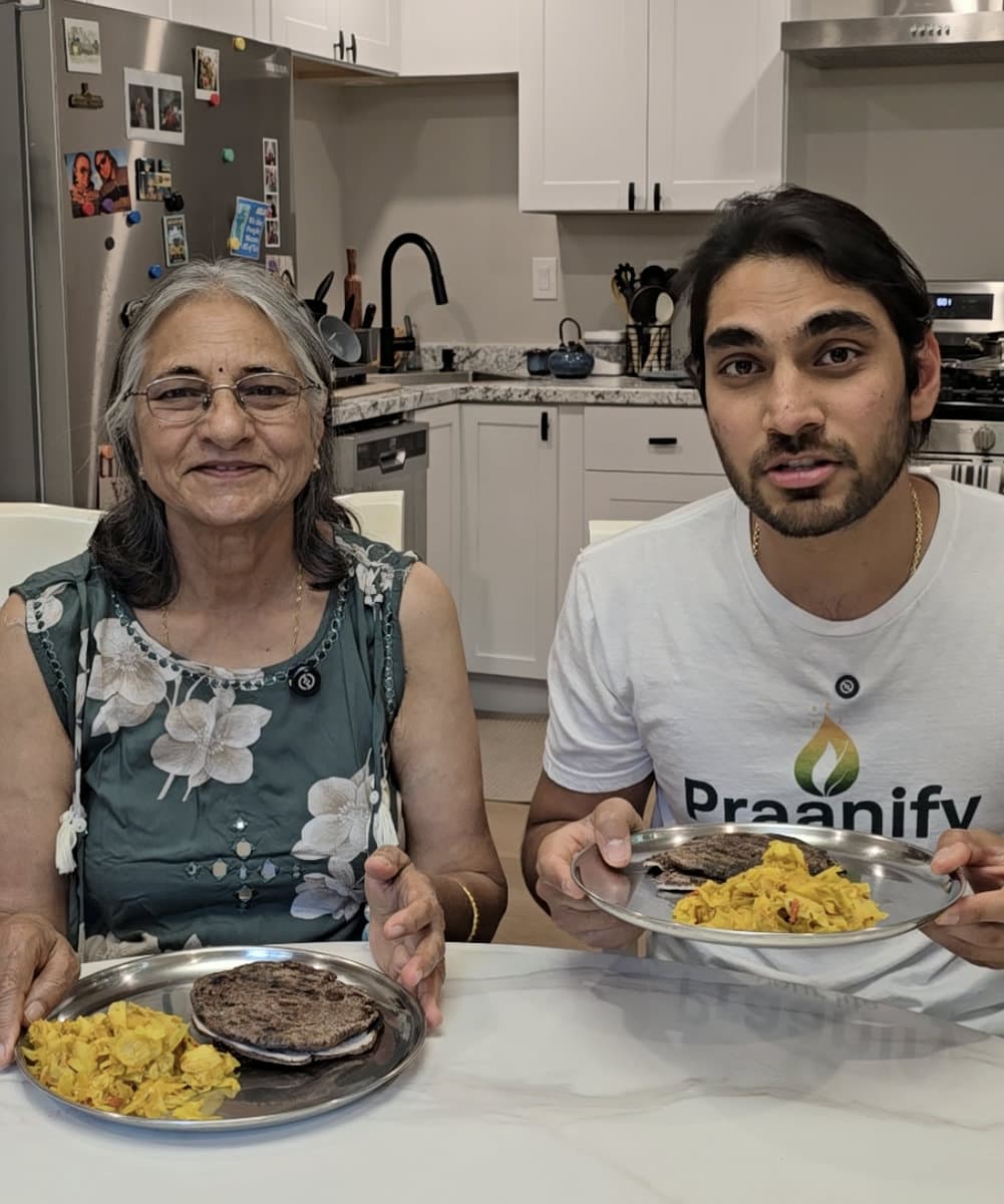 Pranav and his mom sharing a low-spike Indian meal at home